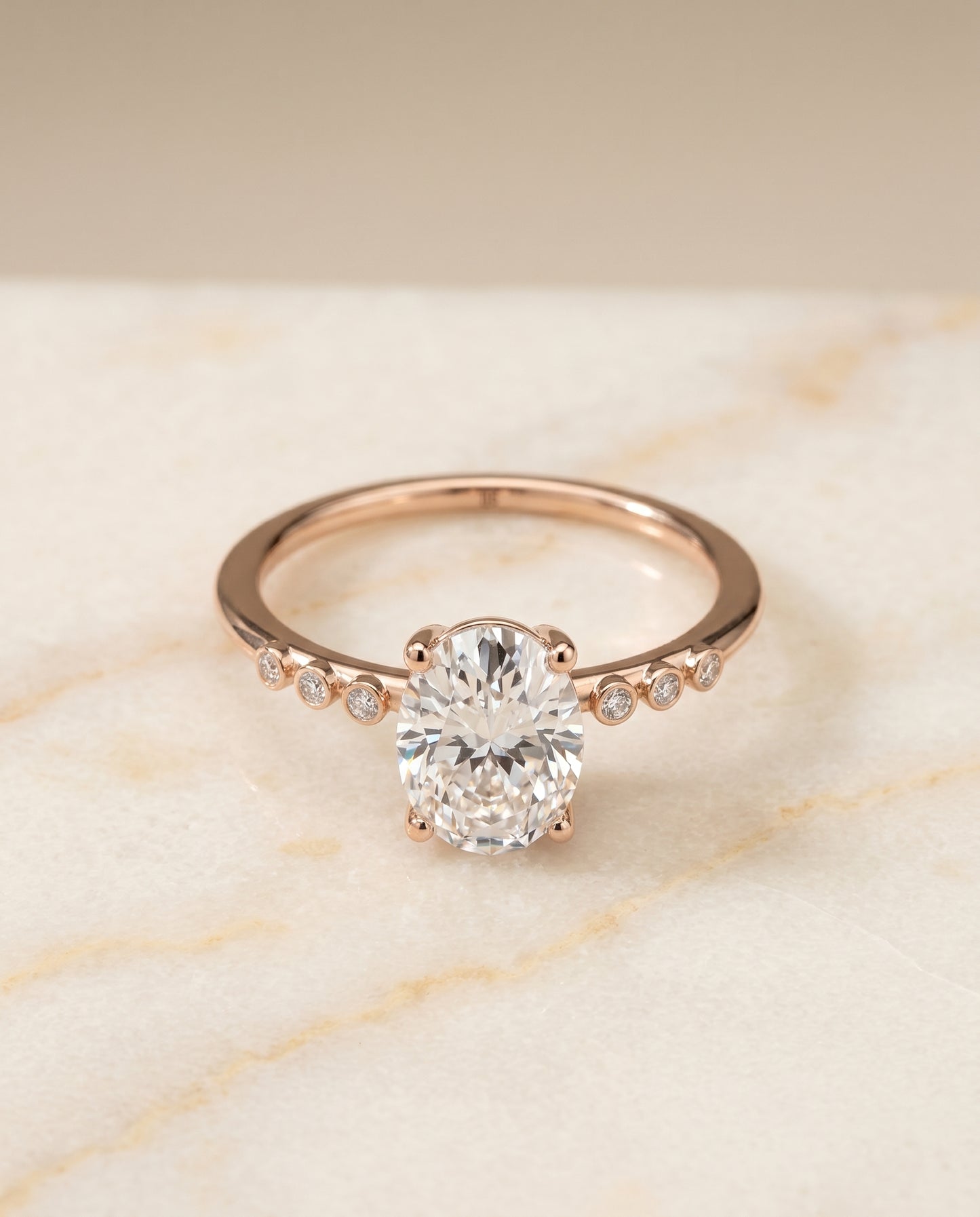 The Peggy Bezel Accent Solitaire Oval Engagement Ring Setting in 14K Rose Gold