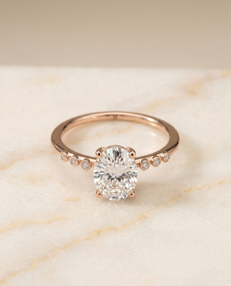 The Peggy Bezel Accent Solitaire Oval Engagement Ring Setting in 14K Rose Gold