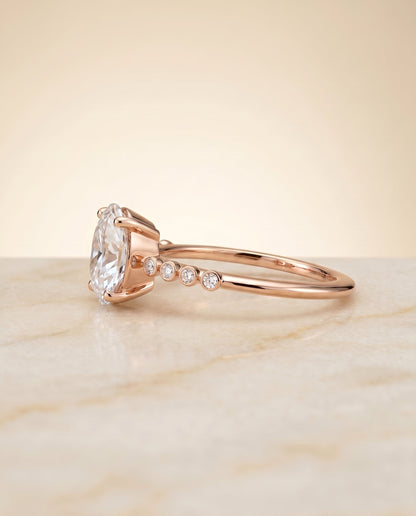 Peggy Select Bezel Accent Solitaire Oval Lab Diamond Engagement Ring in 14K Rose Gold, side view | RockHer