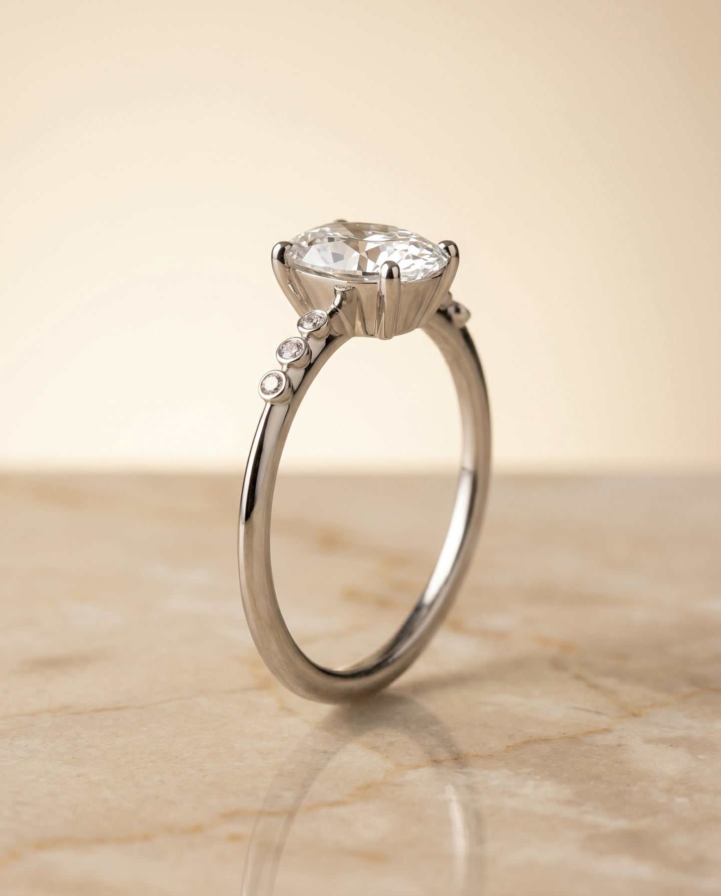 The Peggy Solitaire Engagement Ring Setting for Oval Diamonds in Platinum