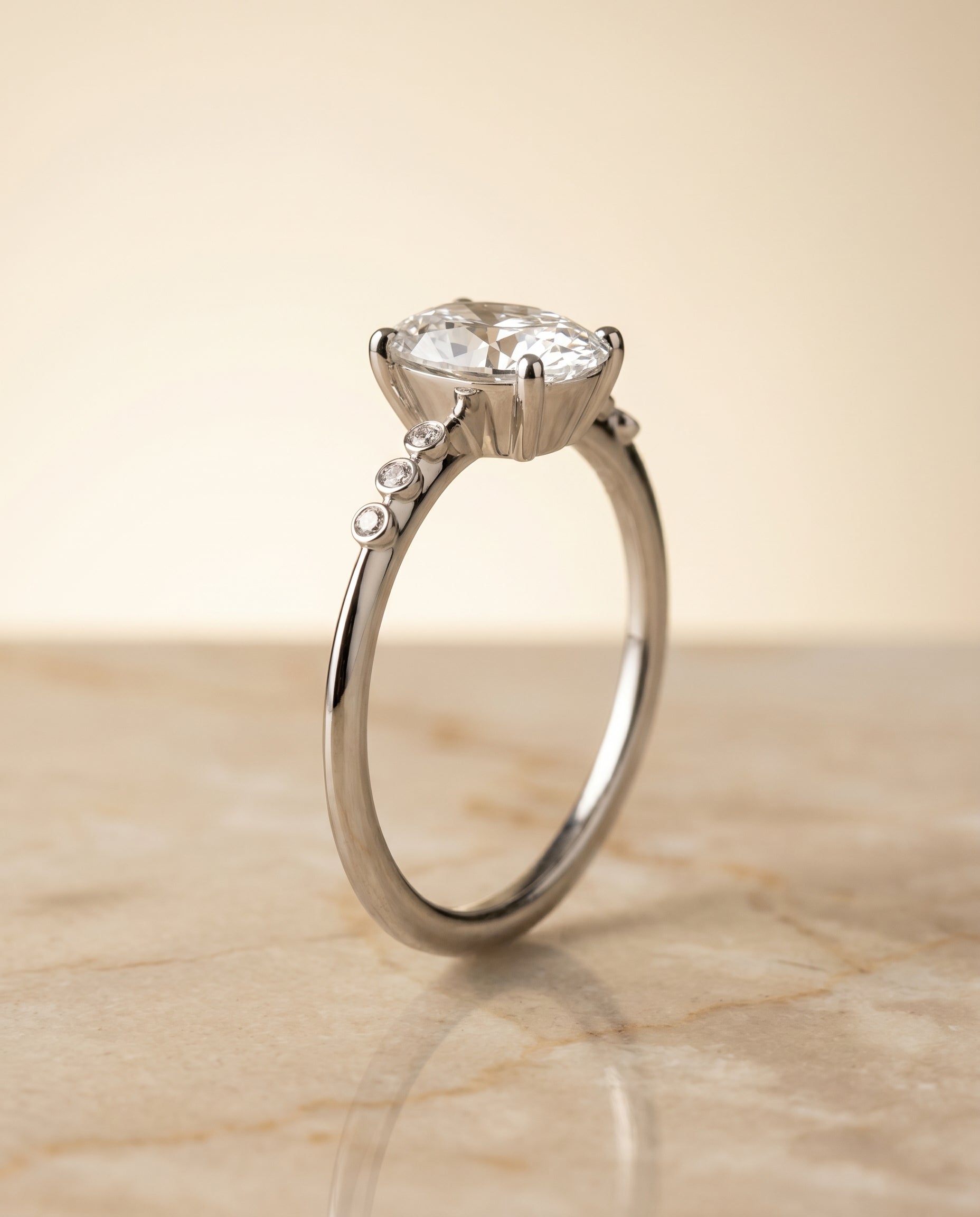Bezel Accent Solitaire styling on The Peggy oval engagement ring setting | RockHer