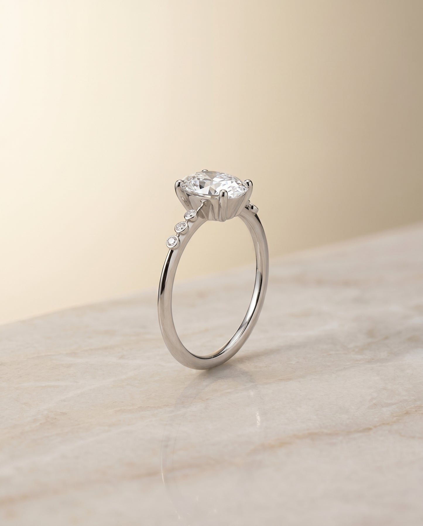 The Peggy Solitaire Engagement Ring Setting for Oval Diamonds in Platinum