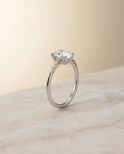 The Peggy Bezel Accent Solitaire Oval Engagement Ring Setting in 18K White Gold