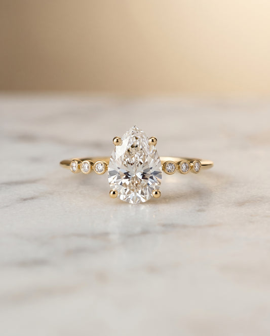 The Peggy Solitaire Engagement Ring Setting for Princess Diamonds in 18K Yellow Gold
