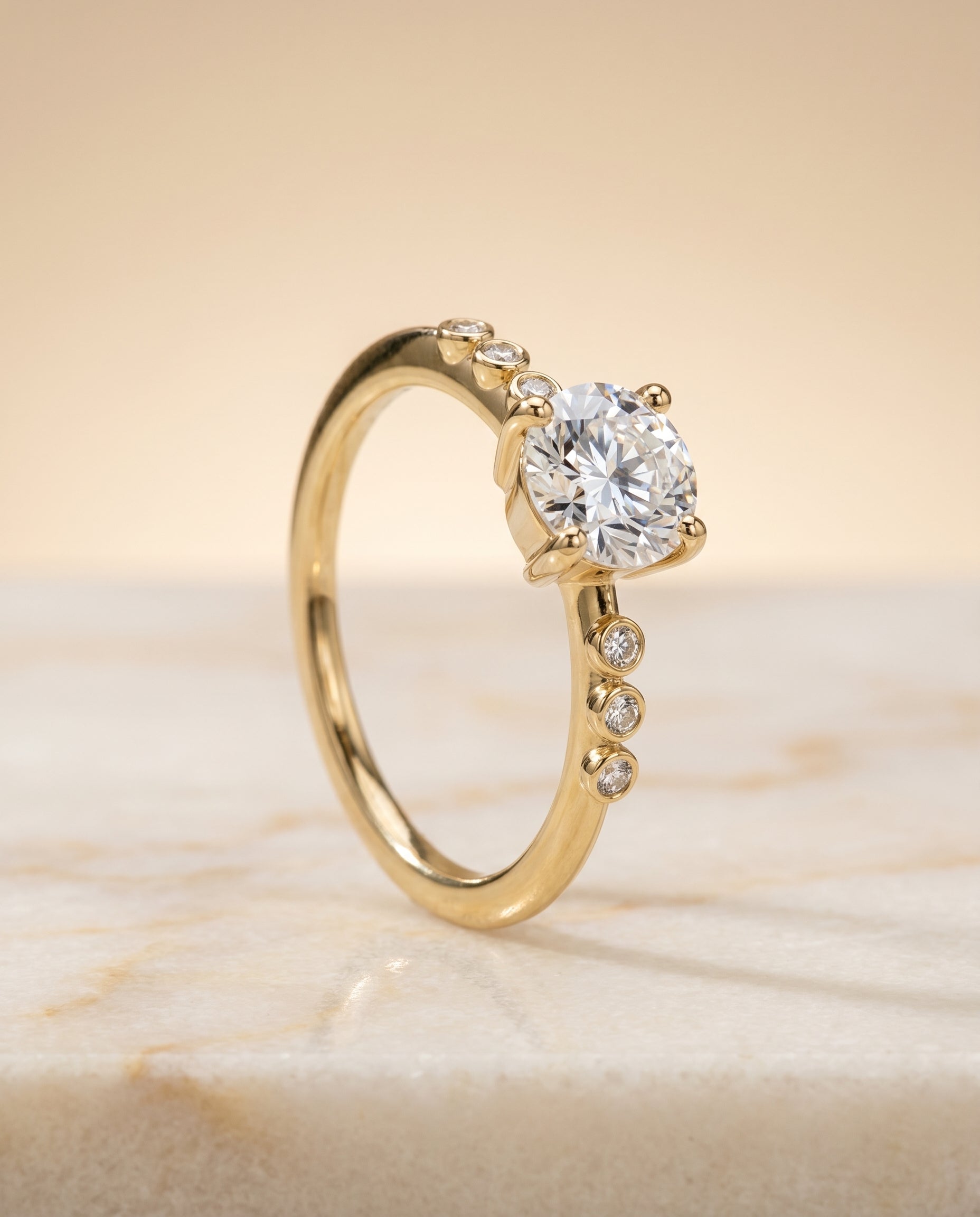 Bezel Accent Solitaire styling on The Peggy round engagement ring setting | RockHer