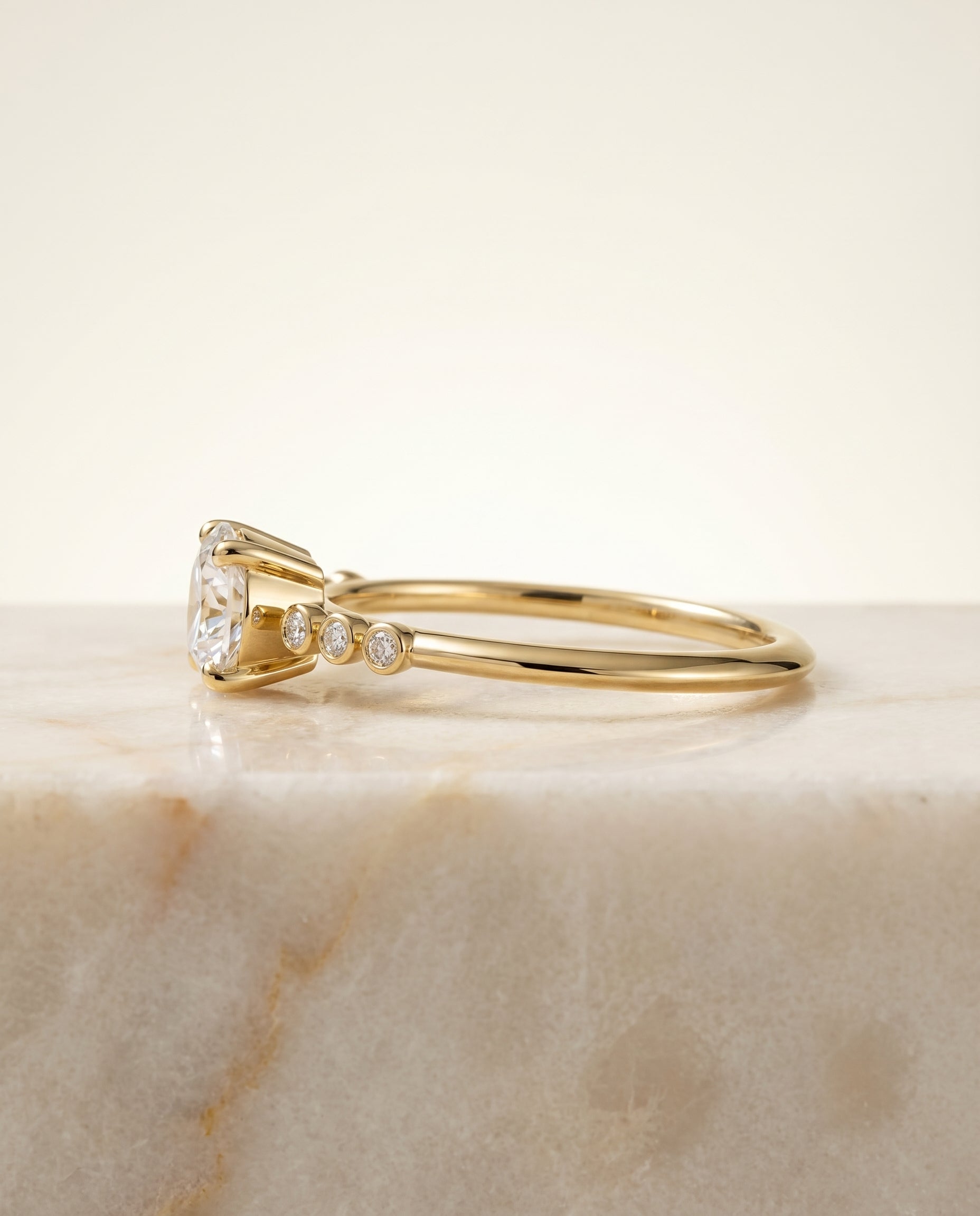 The Peggy setting for round diamonds, made to order in 18K Yellow Gold | RockHer