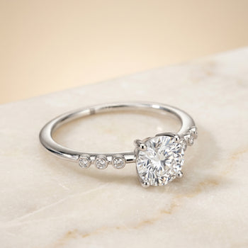 The Peggy Bezel Accent Solitaire Round Engagement Ring Setting in 18K White Gold