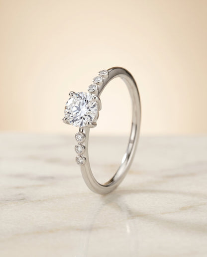 Select Bezel Accent Solitaire Cut styling on The Peggy emerald engagement ring setting | RockHer