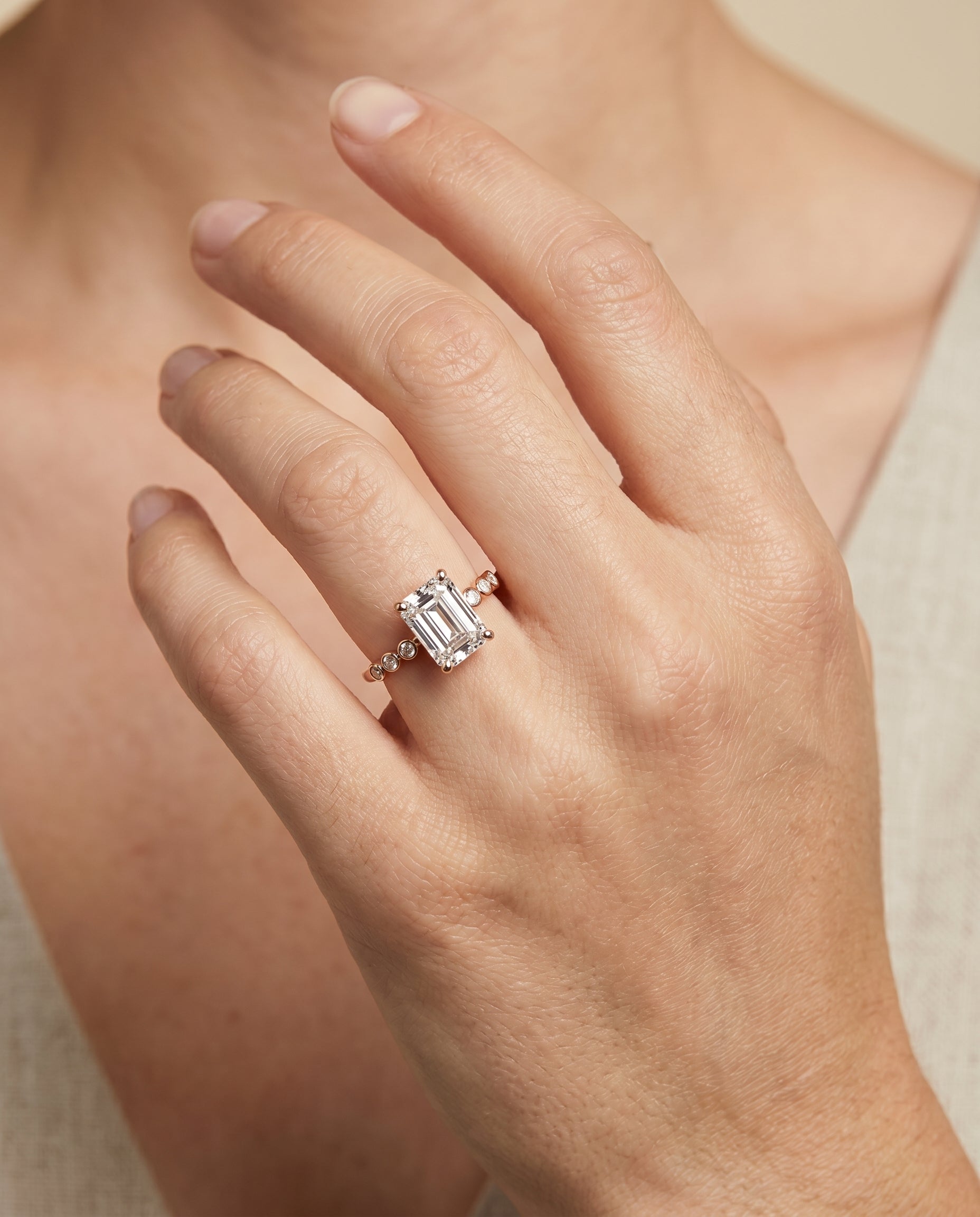 The Peggy engagement ring setting in 14K Rose Gold, bezel accent solitaire cut design | RockHer