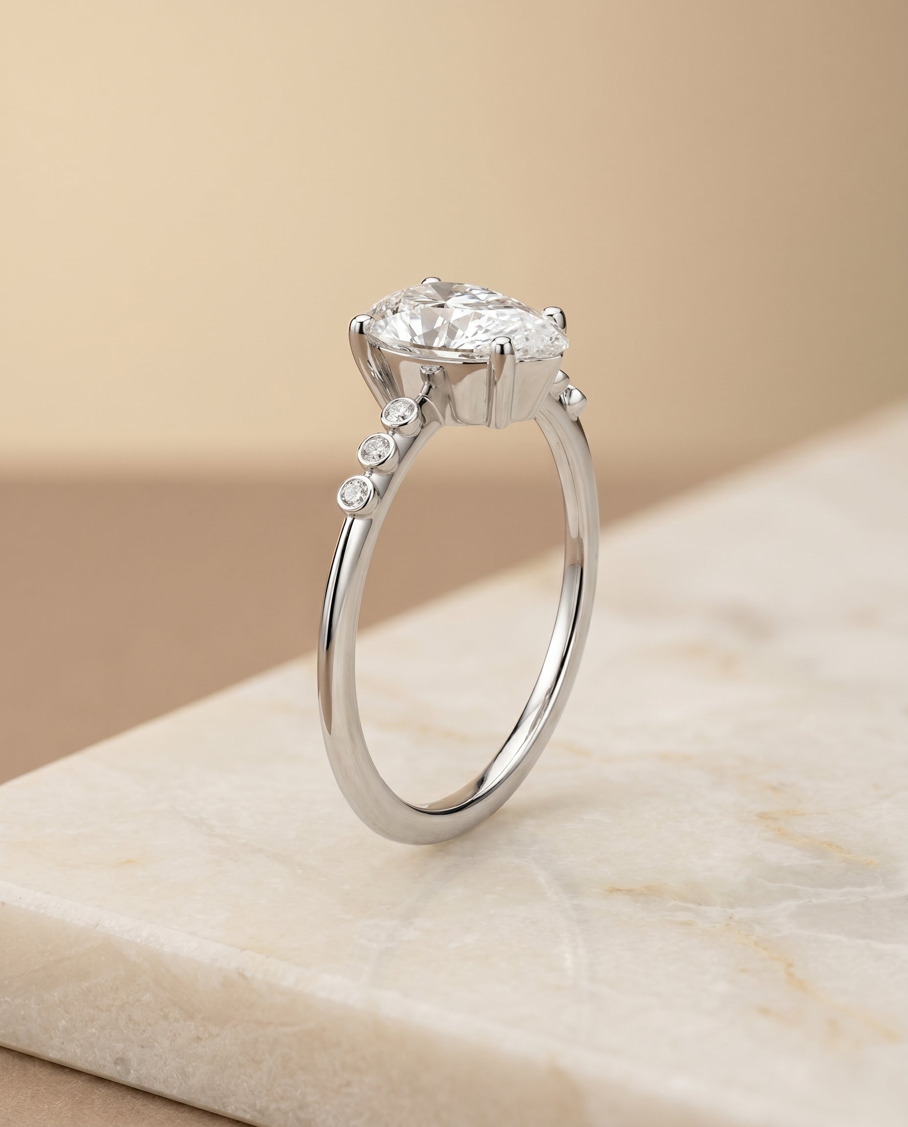 Bezel Accent Solitaire styling on The Peggy princess engagement ring setting | RockHer