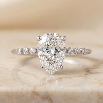 The Peggy Bezel Accent Solitaire Princess Cut Engagement Ring Setting in 18K White Gold