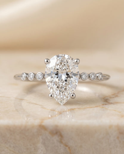The Peggy Bezel Accent Solitaire Princess Cut Engagement Ring Setting in Platinum