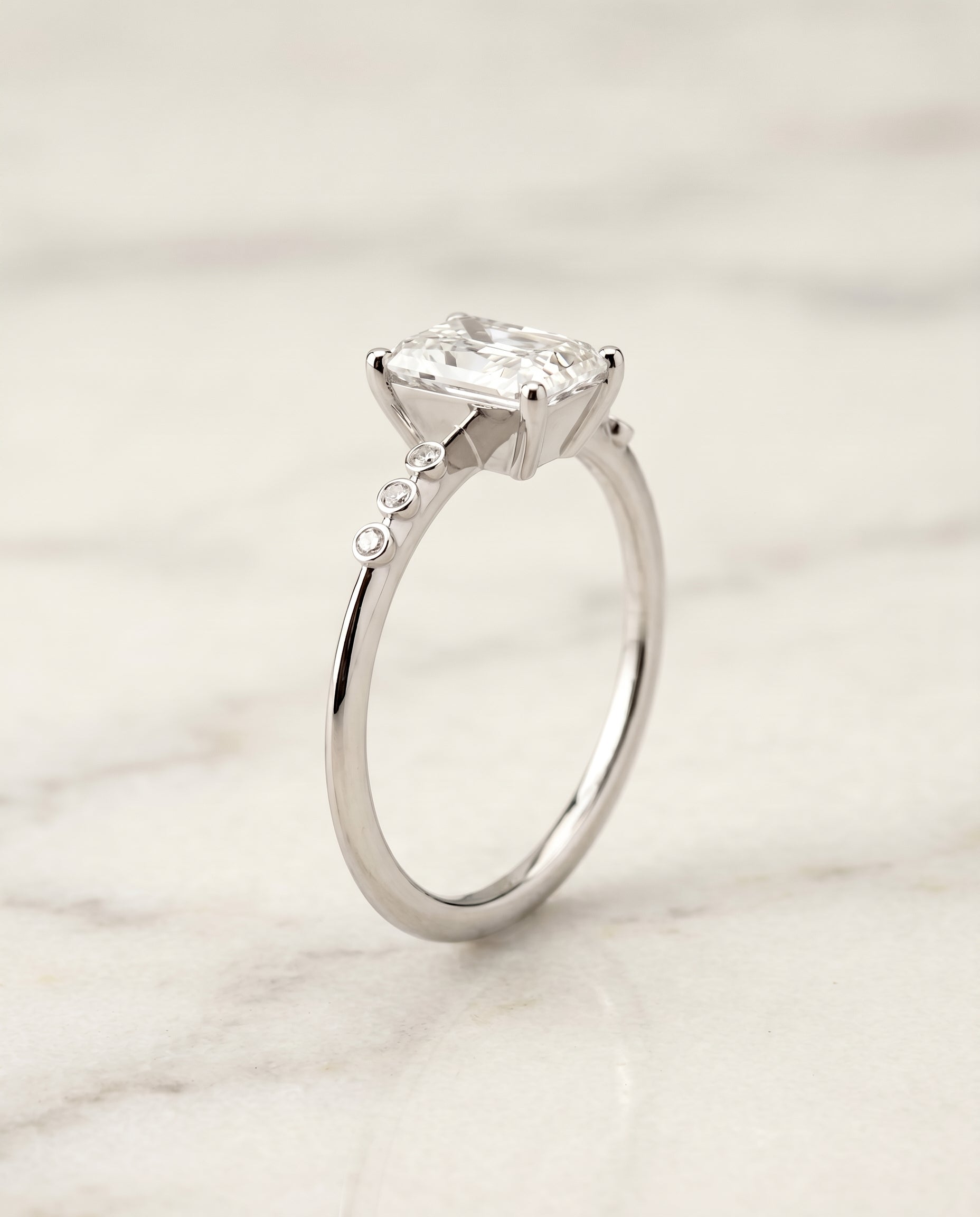 Bezel Accent Solitaire Cut styling on The Peggy radiant engagement ring setting | RockHer