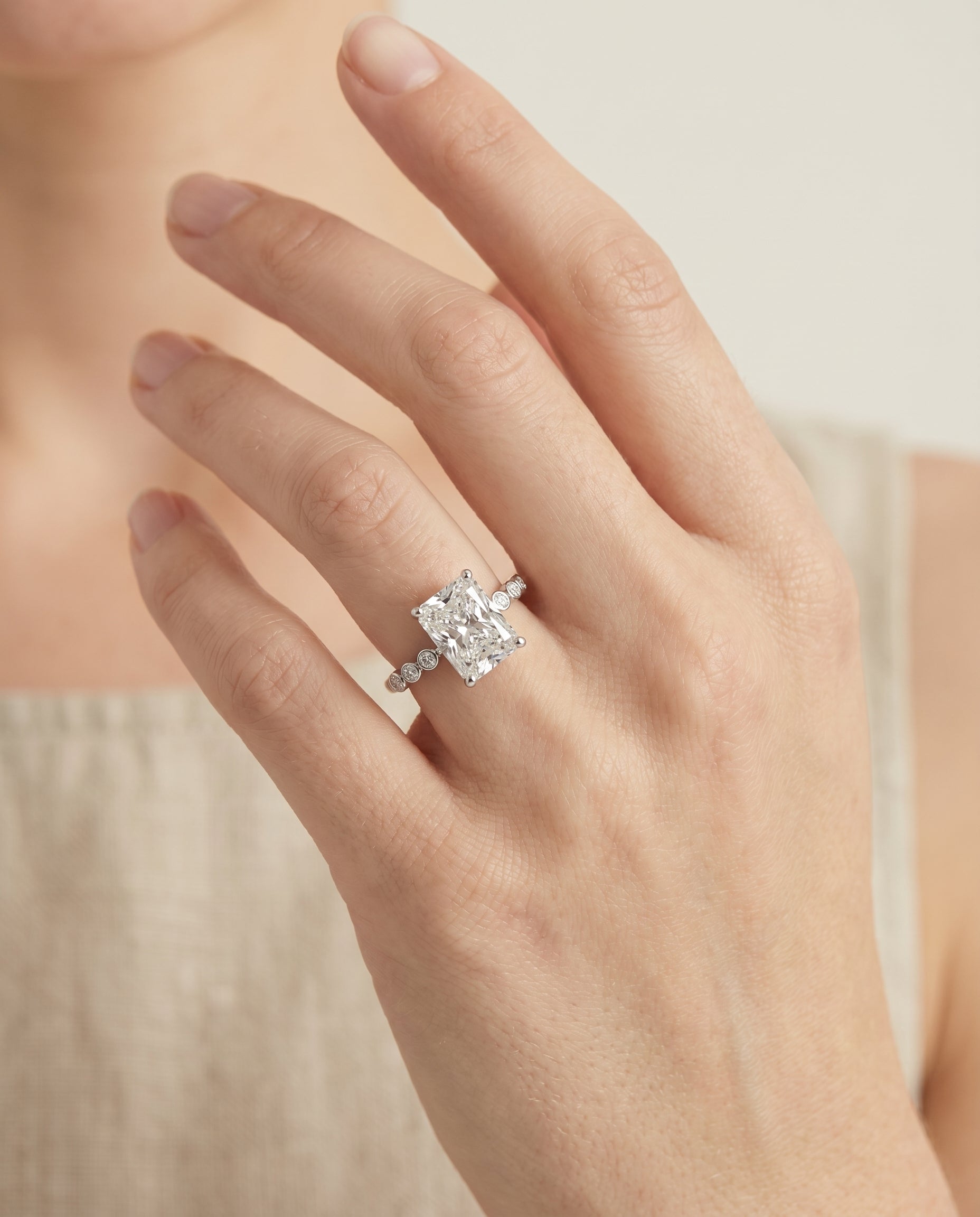 The Peggy engagement ring setting in Platinum, bezel accent solitaire cut design | RockHer