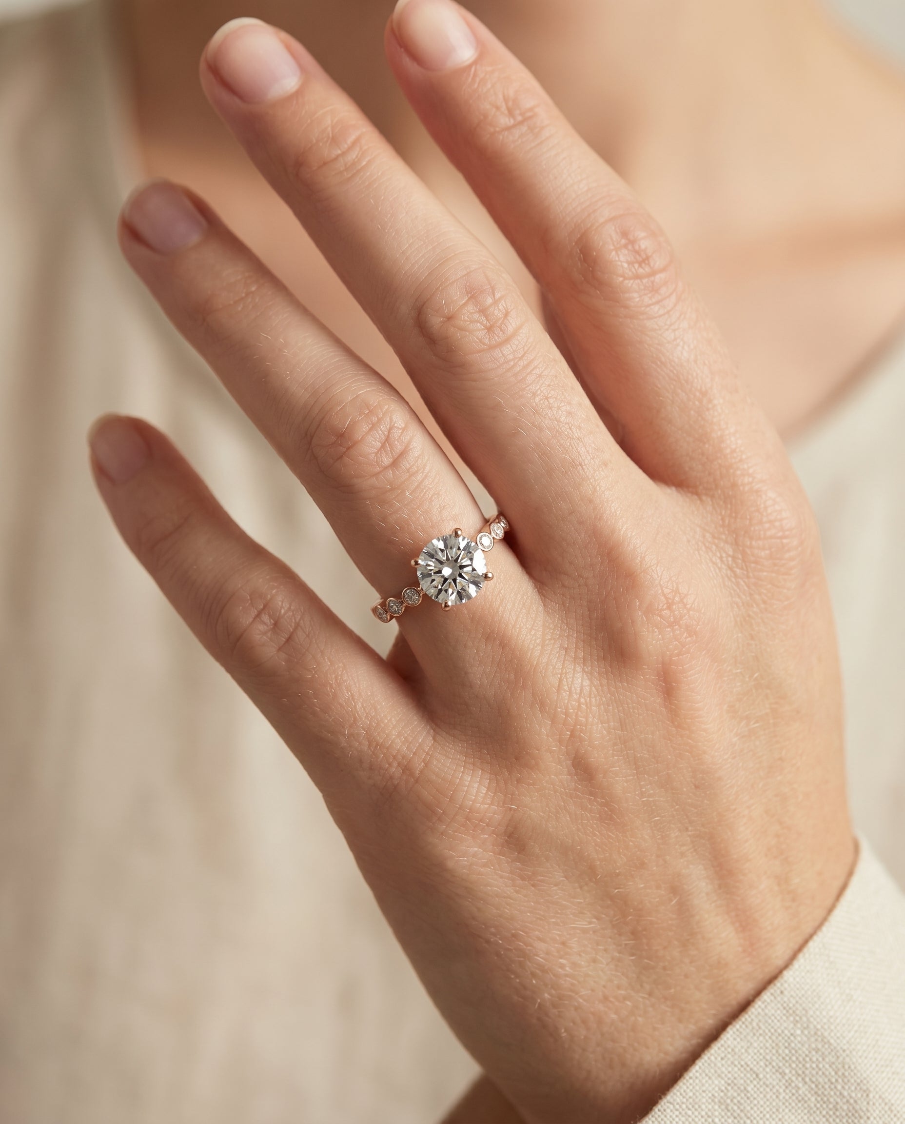 The Peggy engagement ring setting in 14K Rose Gold, bezel accent solitaire design | RockHer