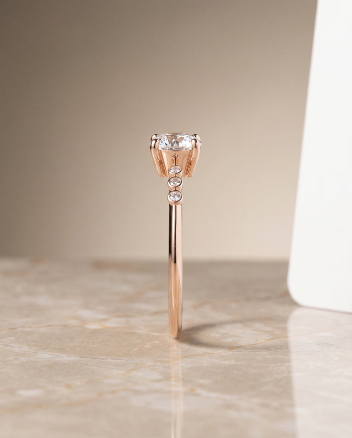 The Peggy Bezel Accent Solitaire Round Engagement Ring Setting in 14K Rose Gold