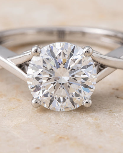 The Priscilla Delicate Twist Cathedral Solitaire Round Engagement Ring Setting in 18K White Gold