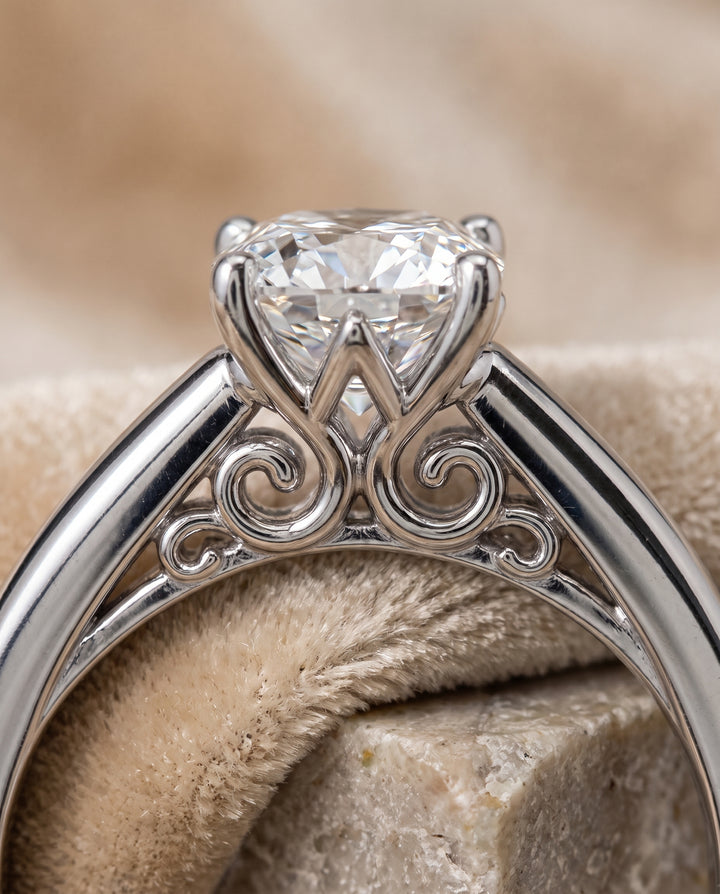 The Rio Scroll Gallery Comfort Fit Solitaire Cushion Cut Engagement Ring Setting in Platinum
