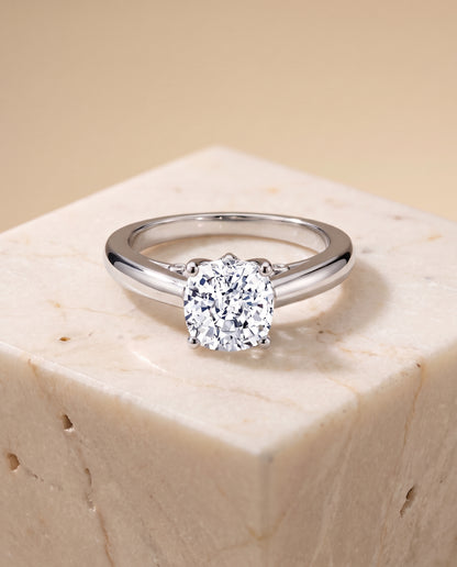 The Rio Scroll Gallery Comfort Fit Solitaire Cushion Cut Engagement Ring Setting in Platinum