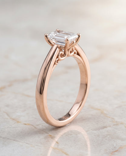 The Rio Scroll Gallery Comfort Fit Solitaire Emerald Cut Engagement Ring Setting in 14K Rose Gold