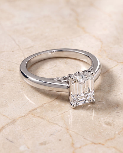 The Rio Scroll Gallery Comfort Fit Solitaire Emerald Cut Engagement Ring Setting in 18K White Gold