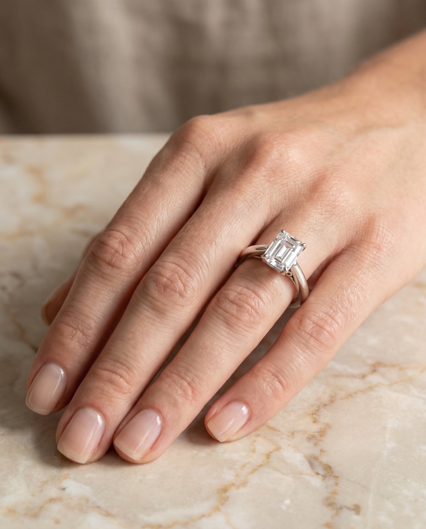 The Rio Scroll Gallery Comfort Fit Solitaire Emerald Cut Engagement Ring Setting in 18K White Gold