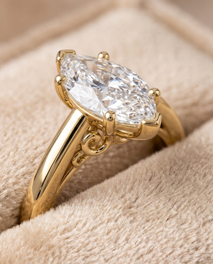 The Rio Scroll Gallery Comfort Fit Solitaire Marquise Engagement Ring Setting in 18K Yellow Gold