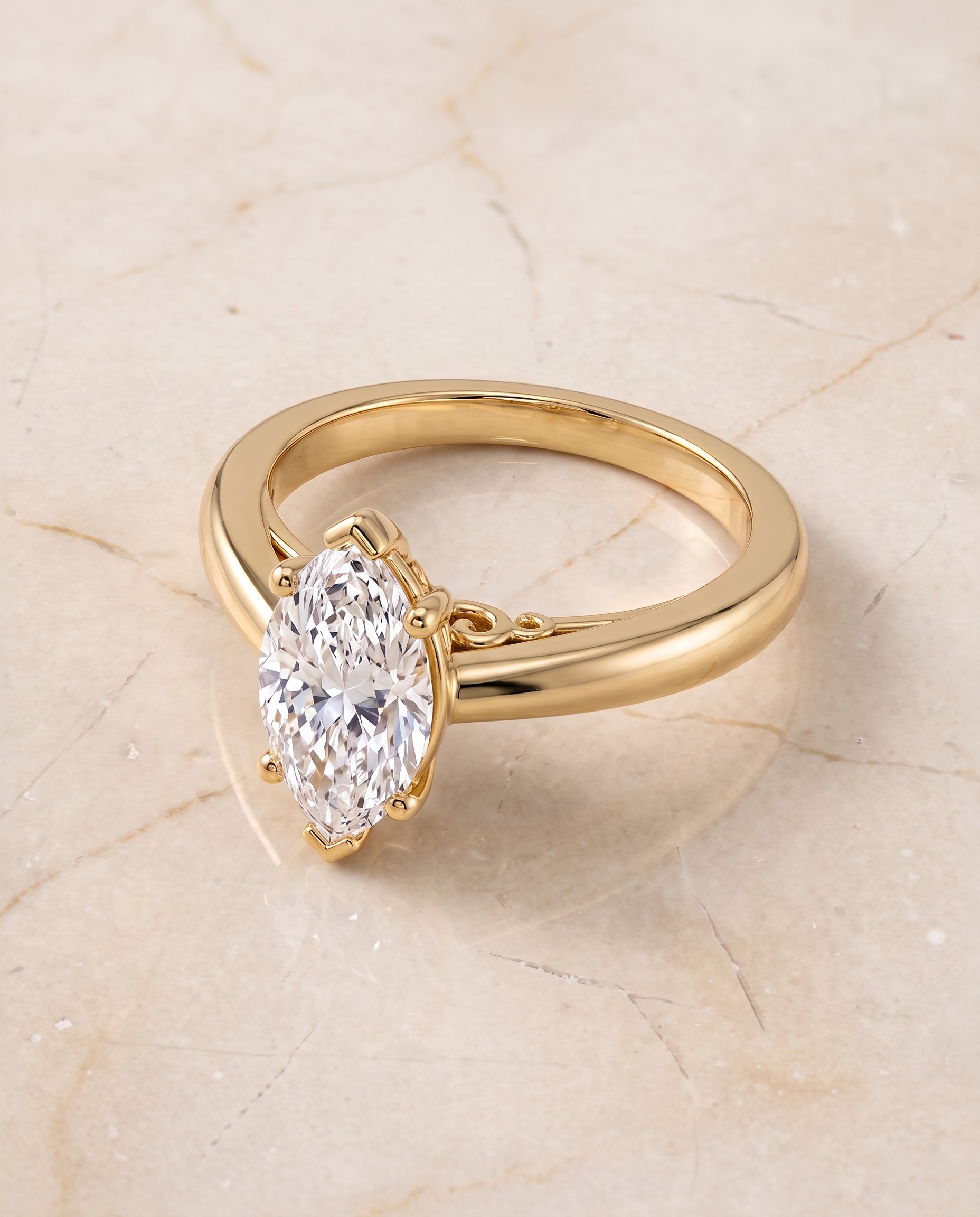 The Rio Scroll Gallery Comfort Fit Solitaire Marquise Engagement Ring Setting in 18K Yellow Gold