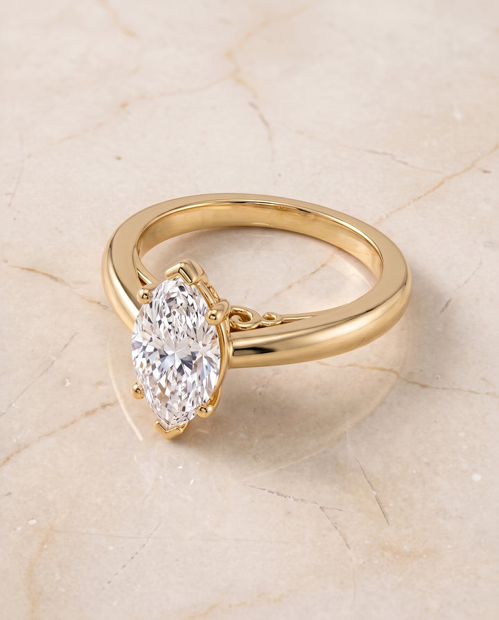 The Rio Scroll Gallery Comfort Fit Solitaire Marquise Engagement Ring Setting in 18K Yellow Gold
