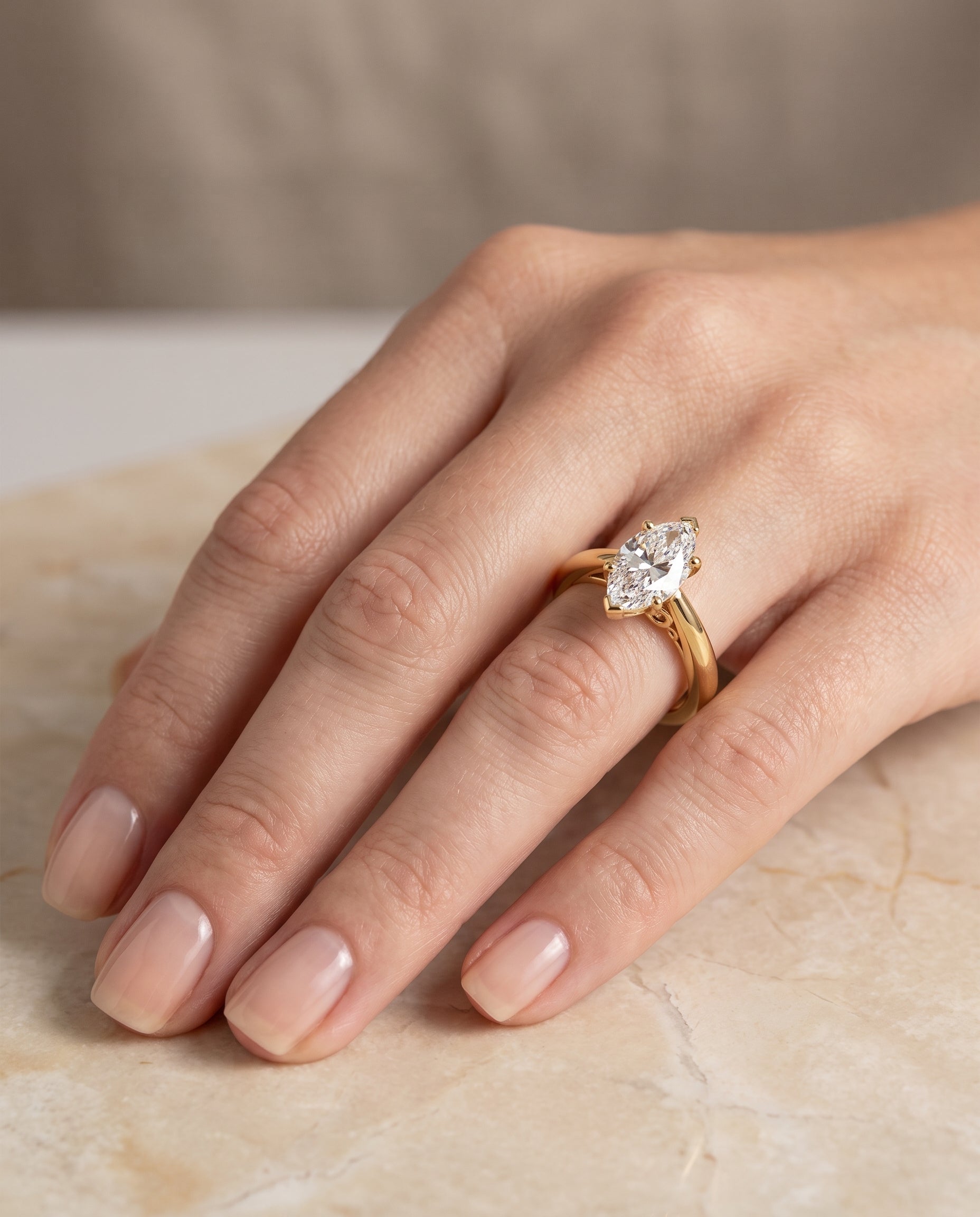 The Rio Scroll Gallery Comfort Fit Solitaire Marquise Engagement Ring Setting in 18K Yellow Gold