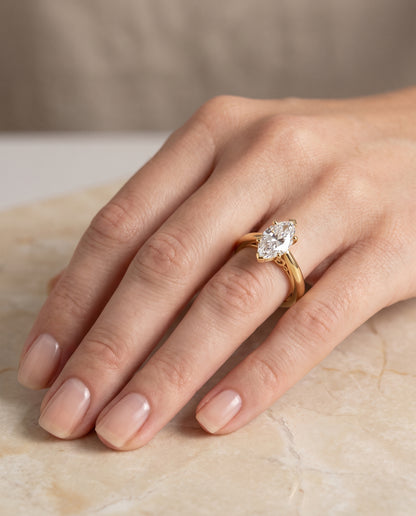 The Rio Scroll Gallery Comfort Fit Solitaire Marquise Engagement Ring Setting in 18K Yellow Gold