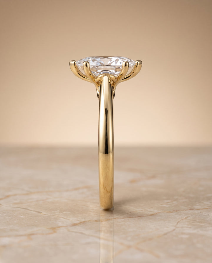The Rio Scroll Gallery Comfort Fit Solitaire Marquise Engagement Ring Setting in 18K Yellow Gold