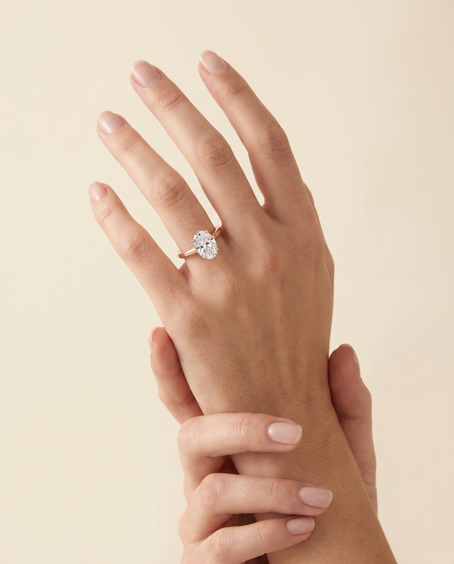 The Rio Scroll Gallery Comfort Fit Solitaire Oval Engagement Ring Setting in 14K Rose Gold