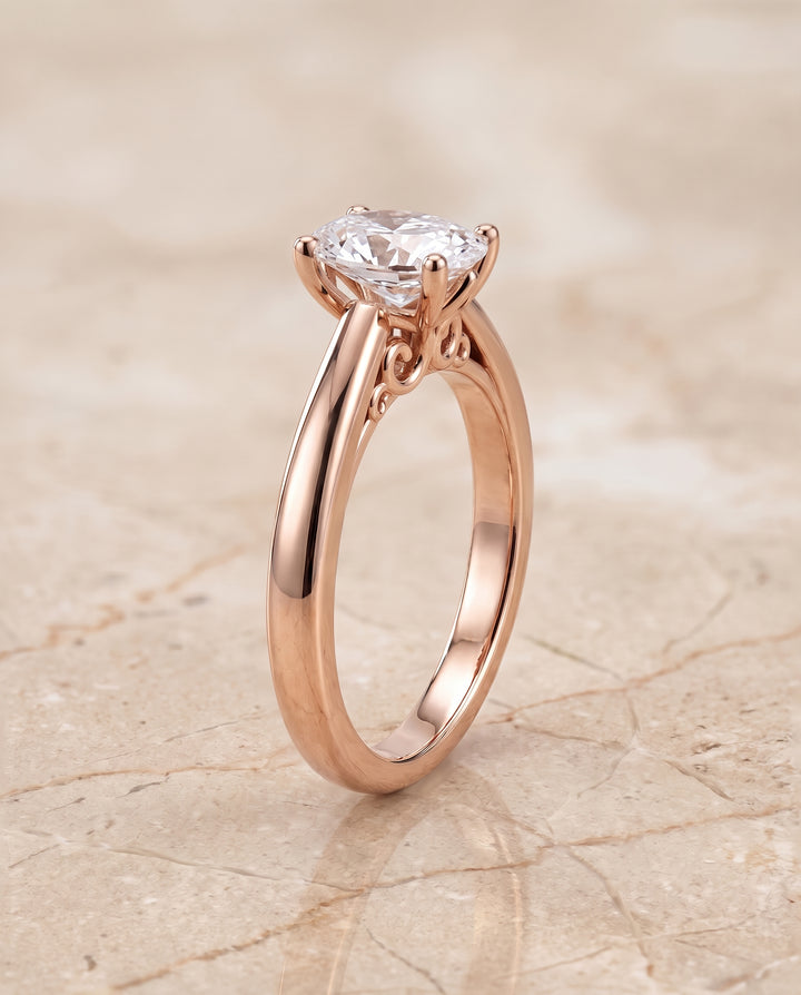 The Rio Scroll Gallery Comfort Fit Solitaire Oval Engagement Ring Setting in 14K Rose Gold