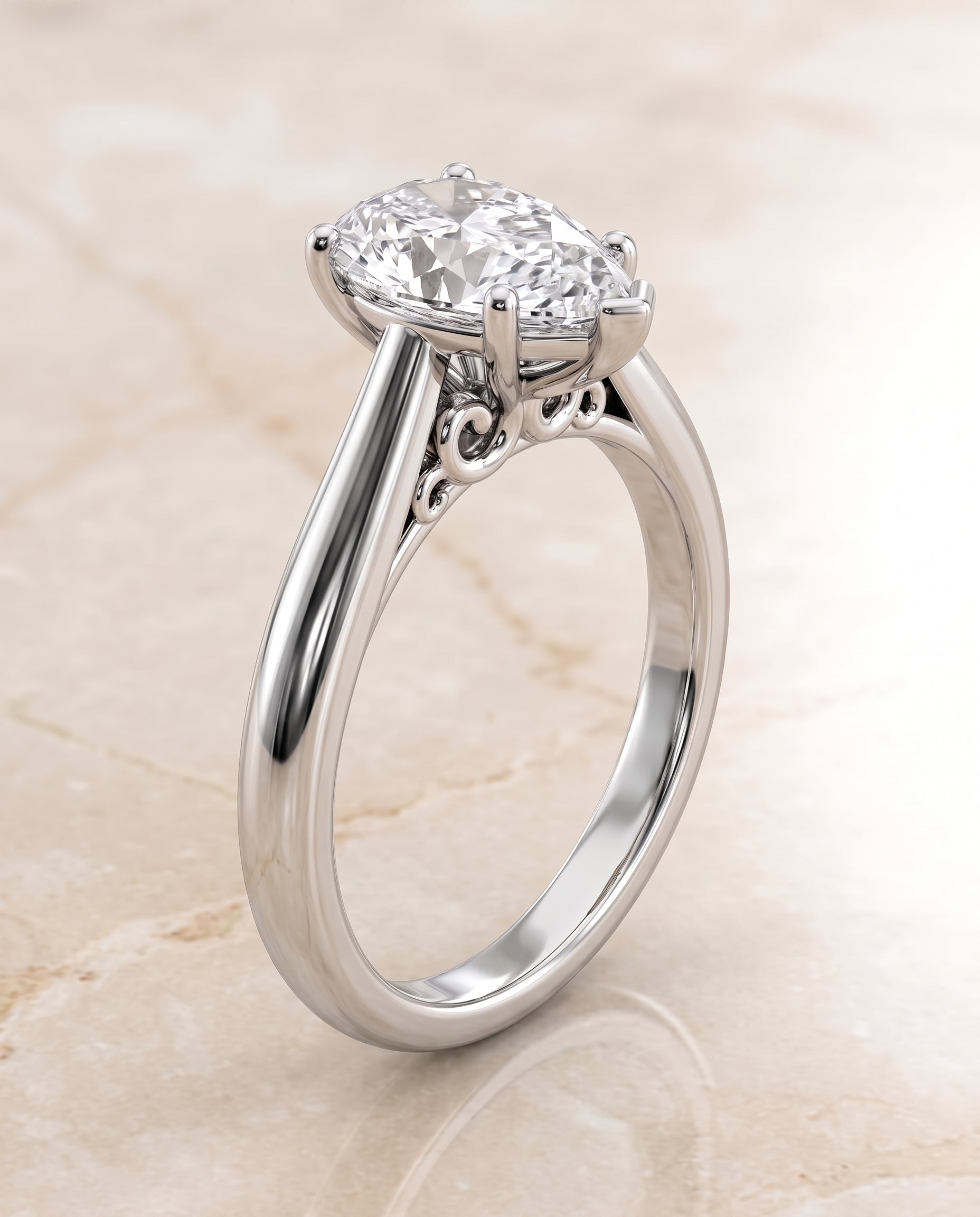 The Rio Scroll Gallery Comfort Fit Solitaire Pear Engagement Ring Setting in 18K White Gold