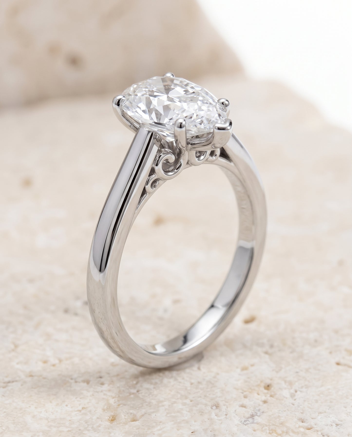 The Rio Scroll Gallery Comfort Fit Solitaire Pear Engagement Ring Setting in 18K White Gold
