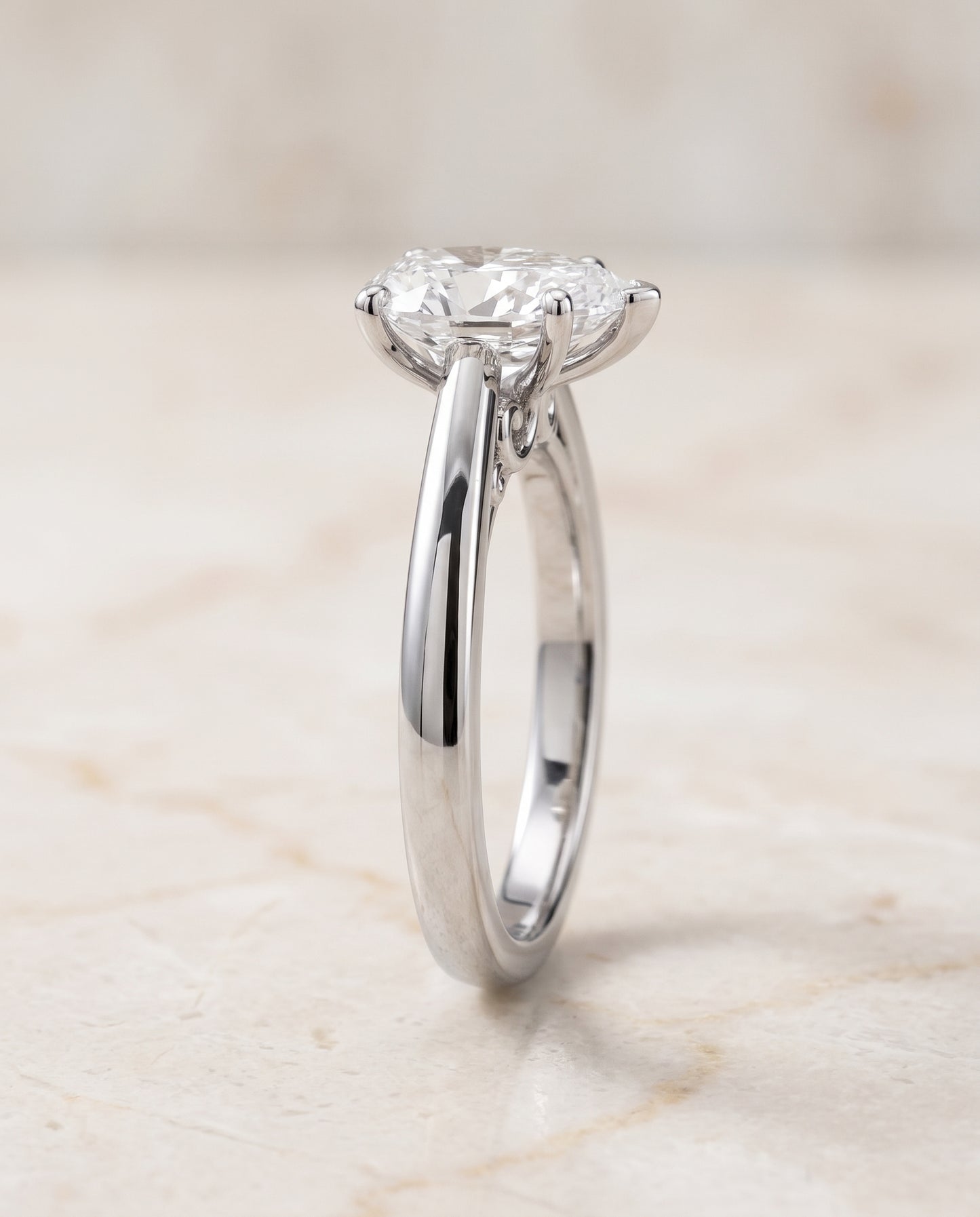The Rio Scroll Gallery Comfort Fit Solitaire Pear Engagement Ring Setting in 18K White Gold
