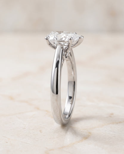 The Rio Scroll Gallery Comfort Fit Solitaire Pear Engagement Ring Setting in 18K White Gold