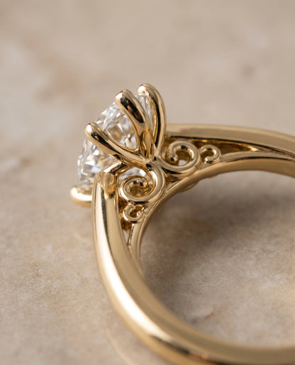 The Rio Scroll Gallery Comfort Fit Solitaire Pear Engagement Ring Setting in 18K Yellow Gold