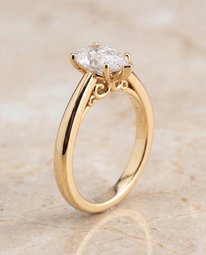 The Rio Scroll Gallery Comfort Fit Solitaire Pear Engagement Ring Setting in 18K Yellow Gold