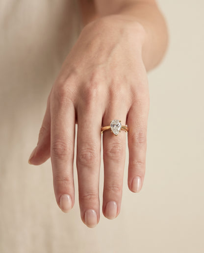 The Rio Scroll Gallery Comfort Fit Solitaire Pear Engagement Ring Setting in 18K Yellow Gold