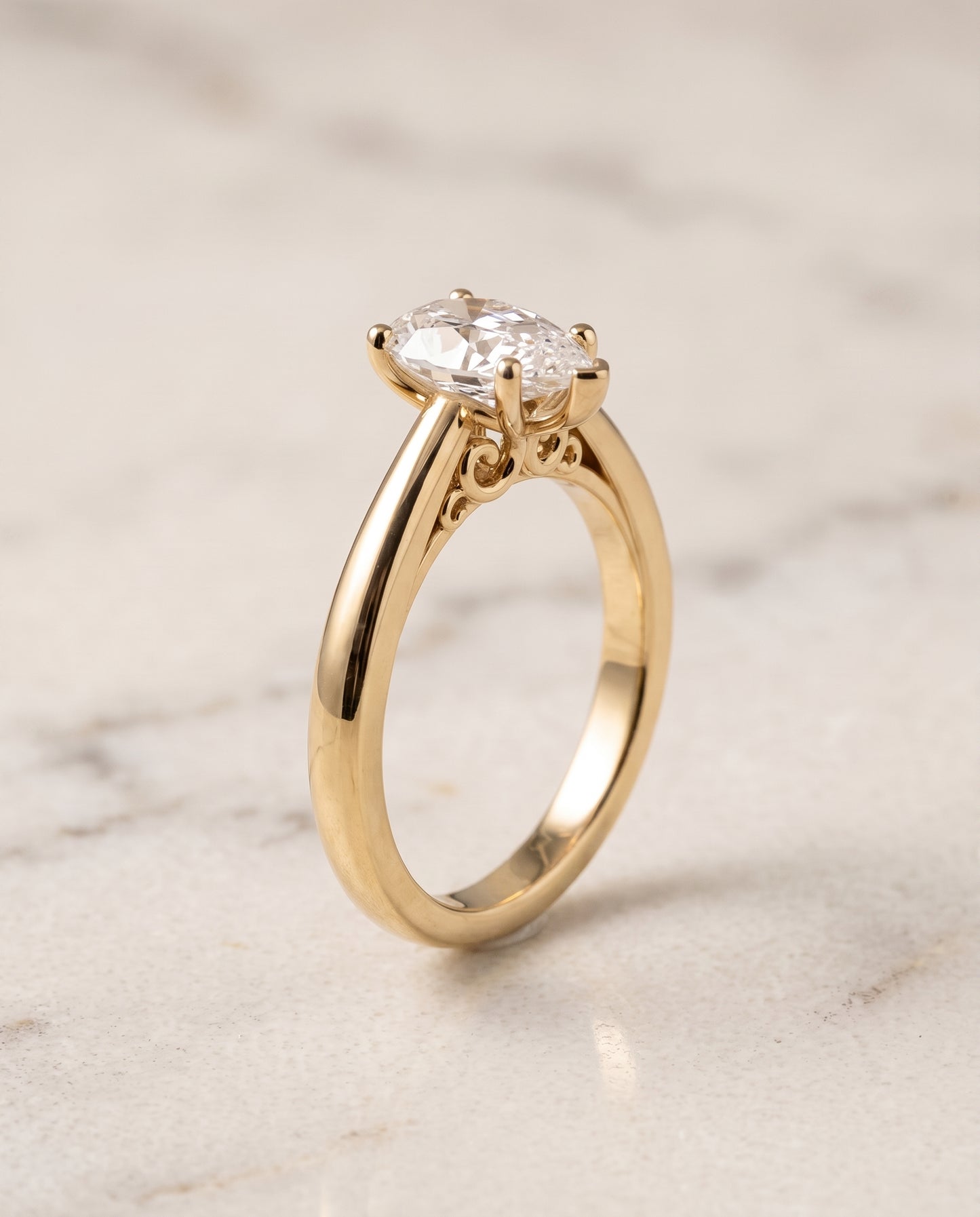 The Rio Scroll Gallery Comfort Fit Solitaire Pear Engagement Ring Setting in 18K Yellow Gold