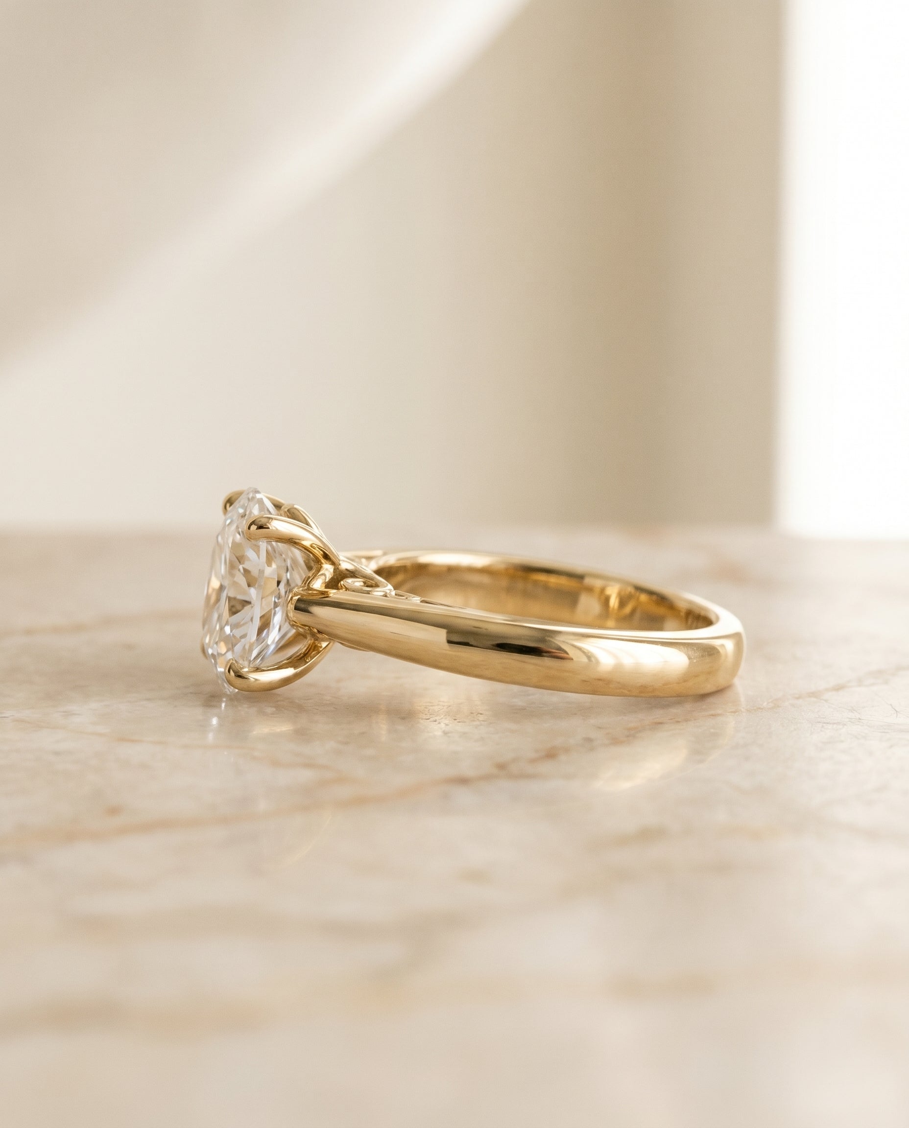 The Rio setting for oval diamonds, made to order in 18K Yellow Gold | RockHer