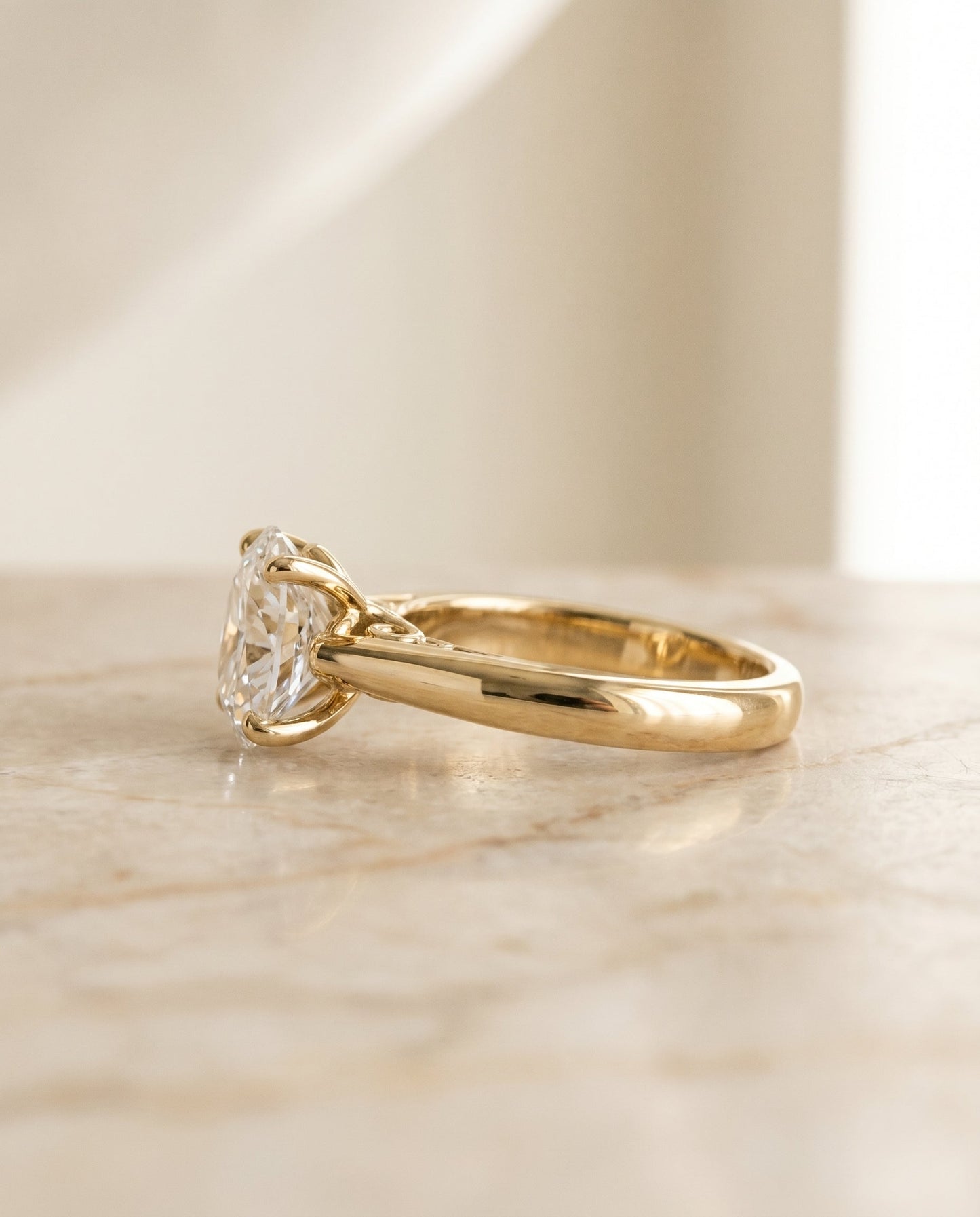 Rio Select Solitaire Oval Lab Diamond Engagement Ring in 18K Yellow Gold, side view | RockHer