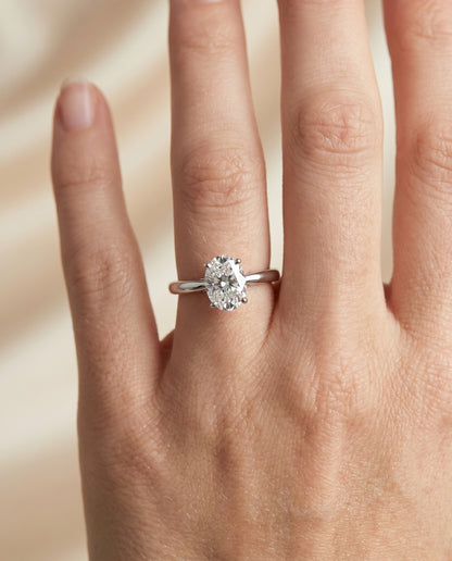 The Rio Scroll Gallery Comfort Fit Solitaire Oval Engagement Ring Setting in Platinum