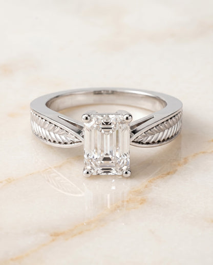 Roberta Select Solitaire Emerald Cut Lab Diamond Engagement Ring in 18K White Gold, shown on hand, angled | RockHer