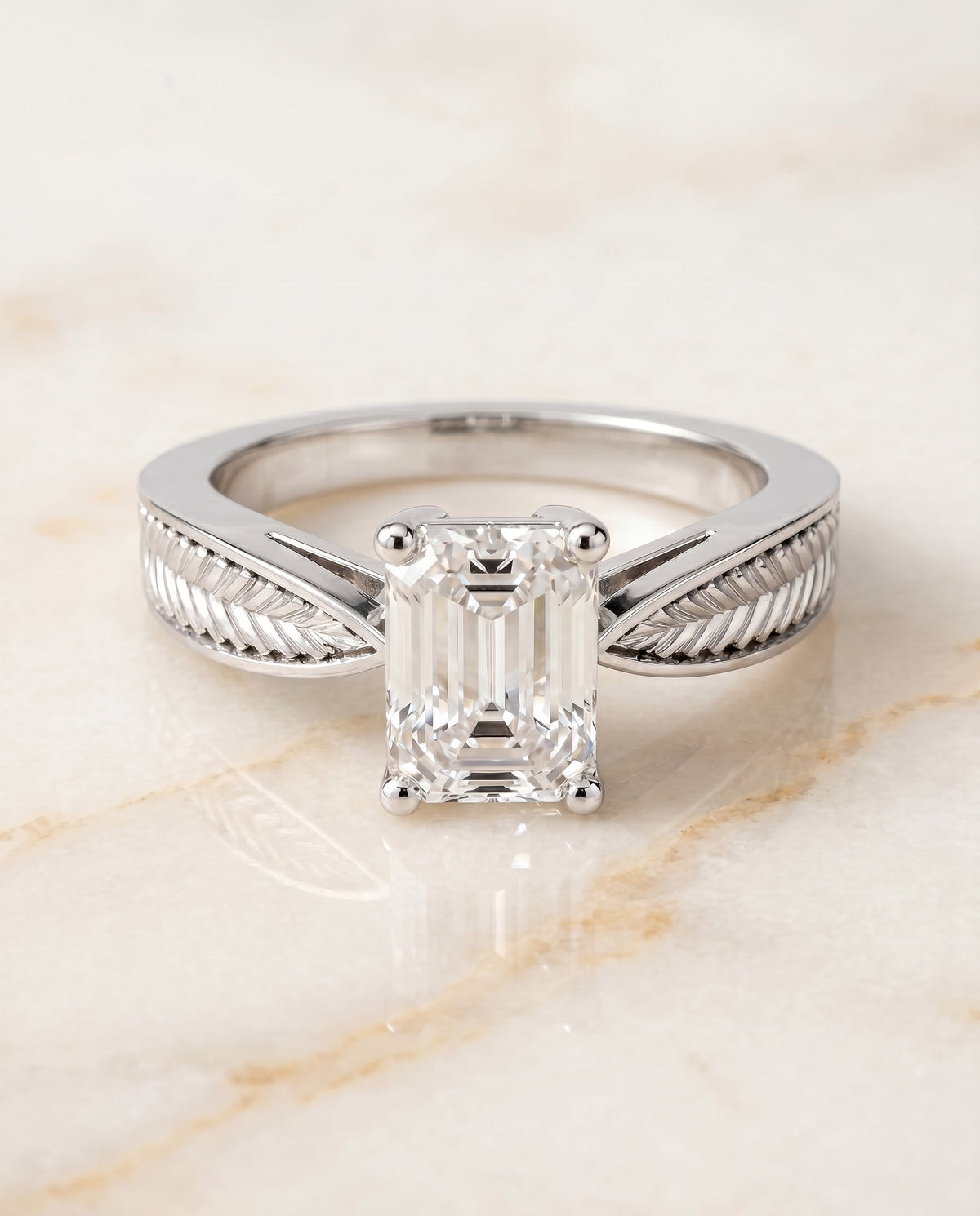Roberta Select Solitaire Emerald Cut Lab Diamond Engagement Ring in Platinum, shown on hand, angled | RockHer