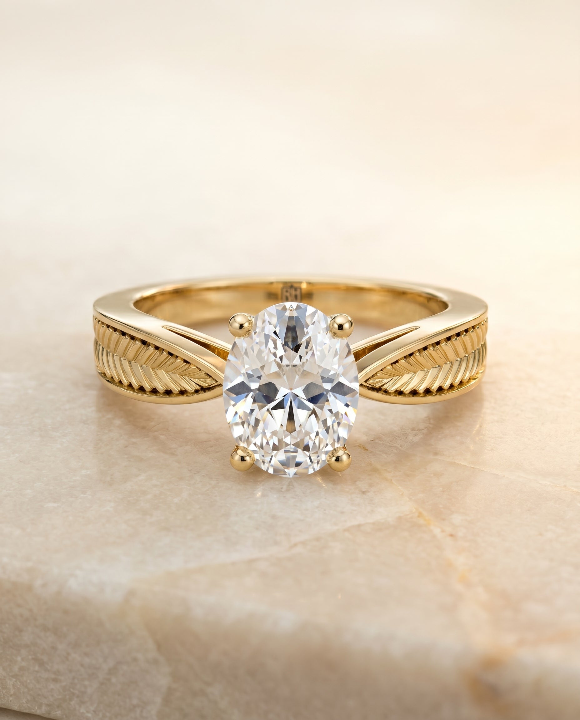 The Roberta Solitaire Engagement Ring Setting for Oval Diamonds in 18K Yellow Gold