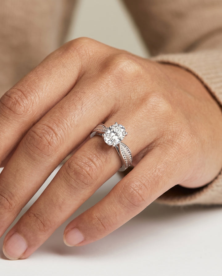 The Roberta Solitaire Engagement Ring Setting for Oval Diamonds in 18K White Gold