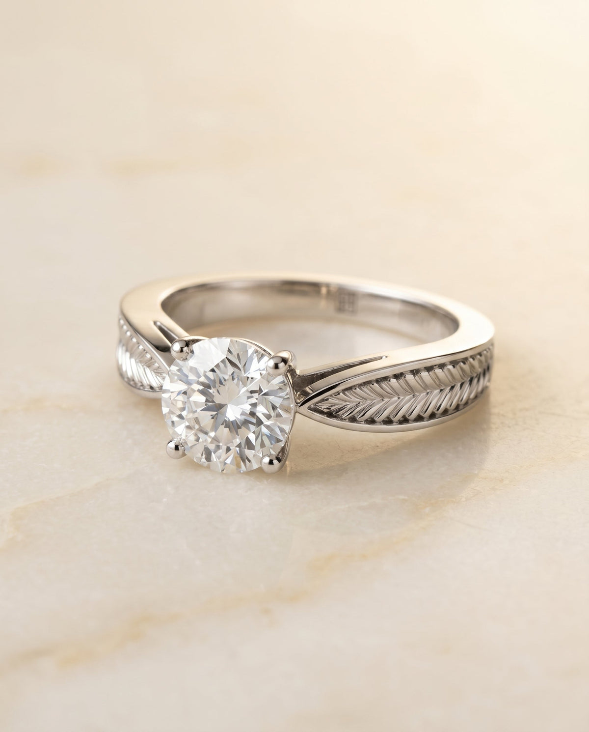 Roberta Select Solitaire Round Lab Diamond Engagement Ring in Platinum, shown on hand, angled | RockHer
